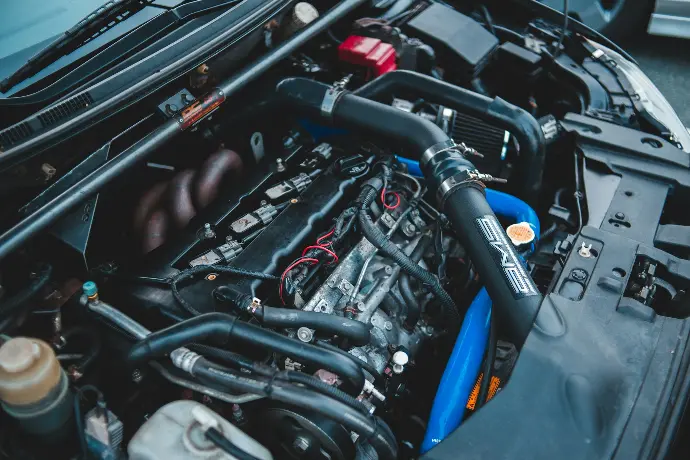 black and blue car engine bay